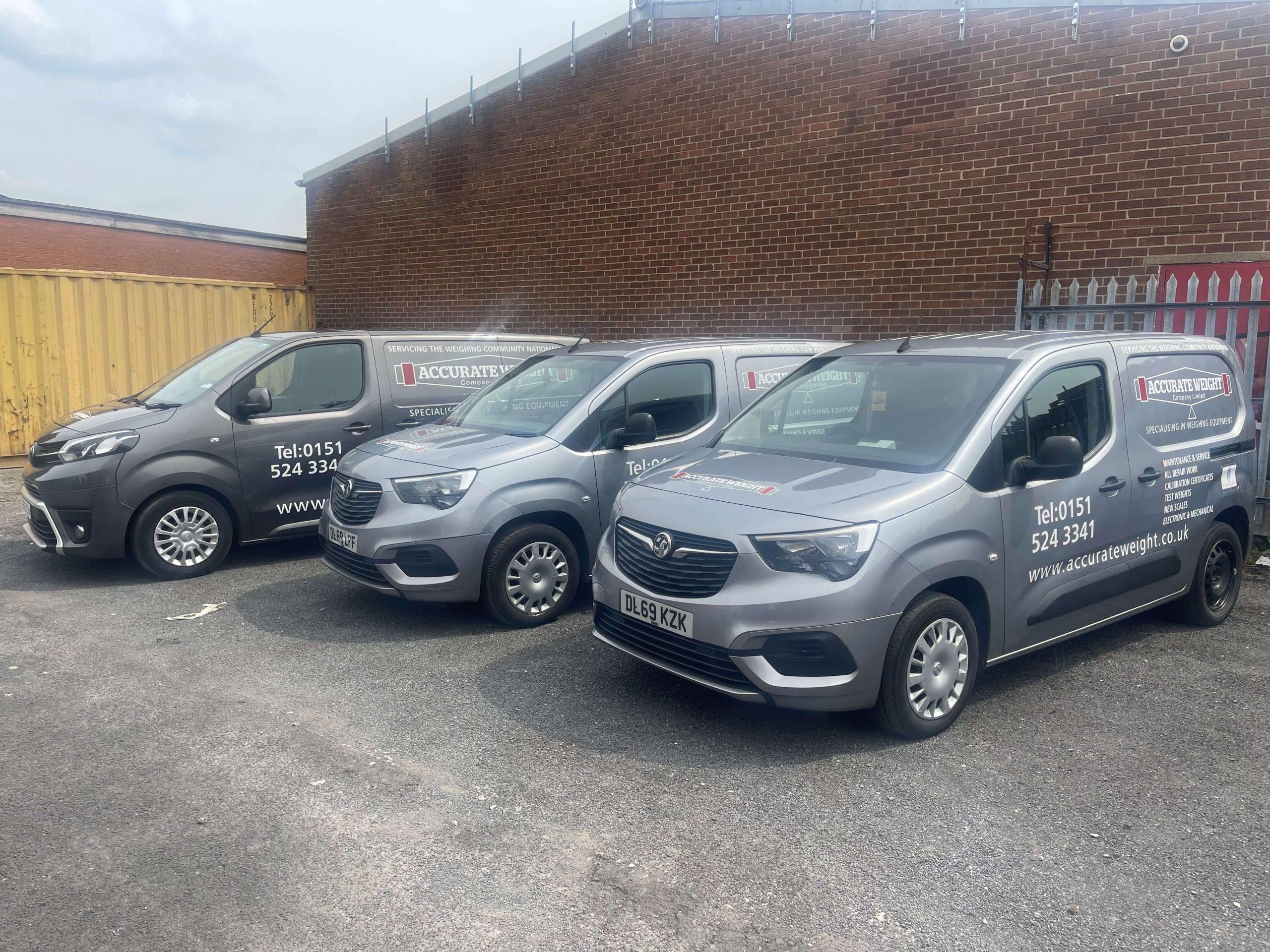 Accurate Weight service vans used for on-site scale calibration and repair services.